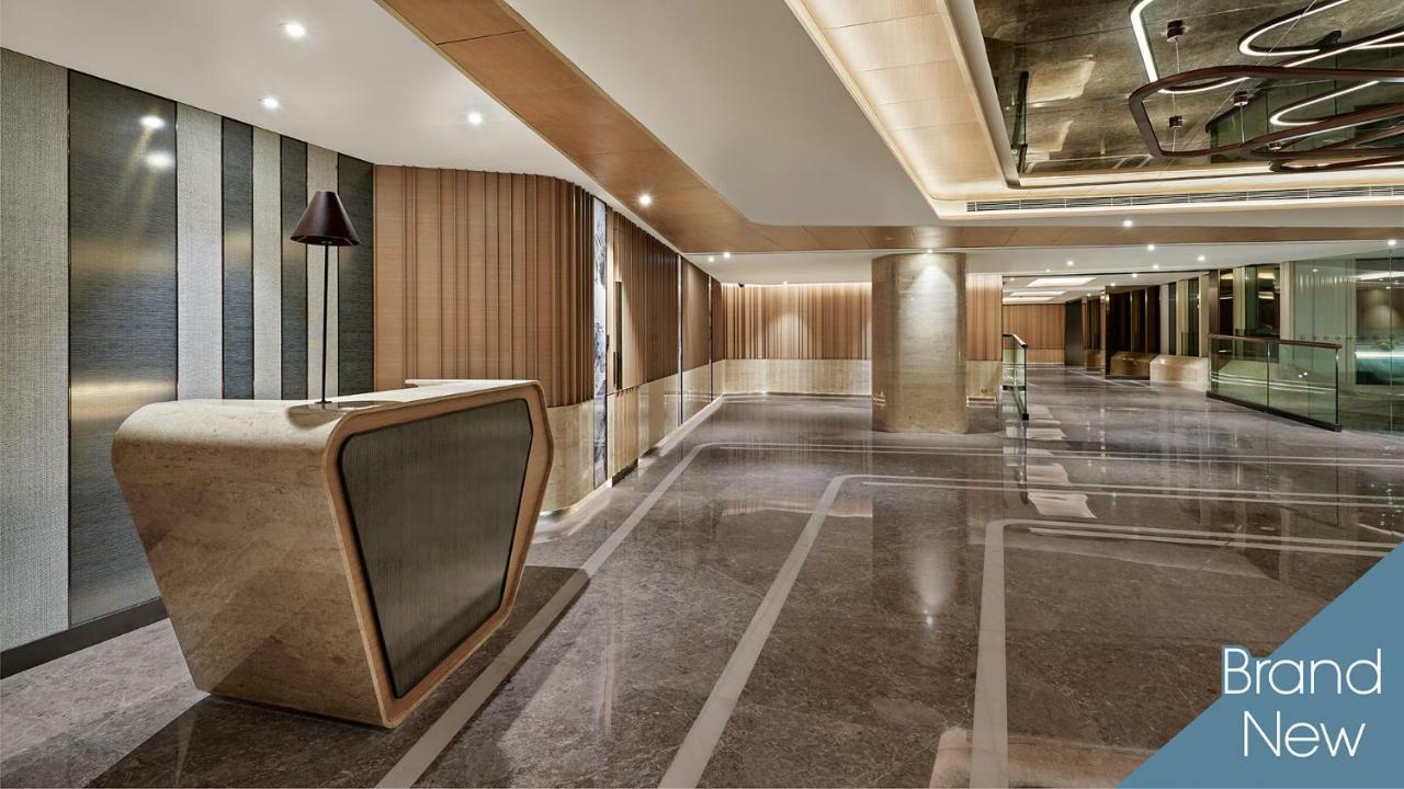 فندق هاربور غراند كولون هونغ كونغ المظهر الخارجي الصورة The lobby of the hotel